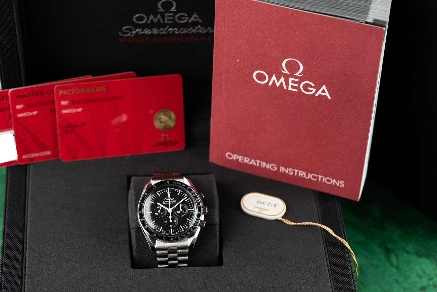 Omega Speedmaster Moonwatch 310.30.42.50.01.001 Hesalite UNWORN full set box and papers - The Watch Business
