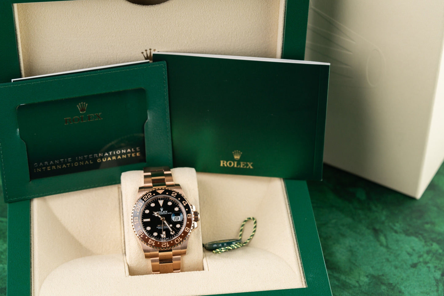 Buy a Rolex GMT-Master II 18k Everose gold watch, model 126715CHNR, Root Beer, 2023, pre-owned luxury watch sold by The Watch Business Sydney.