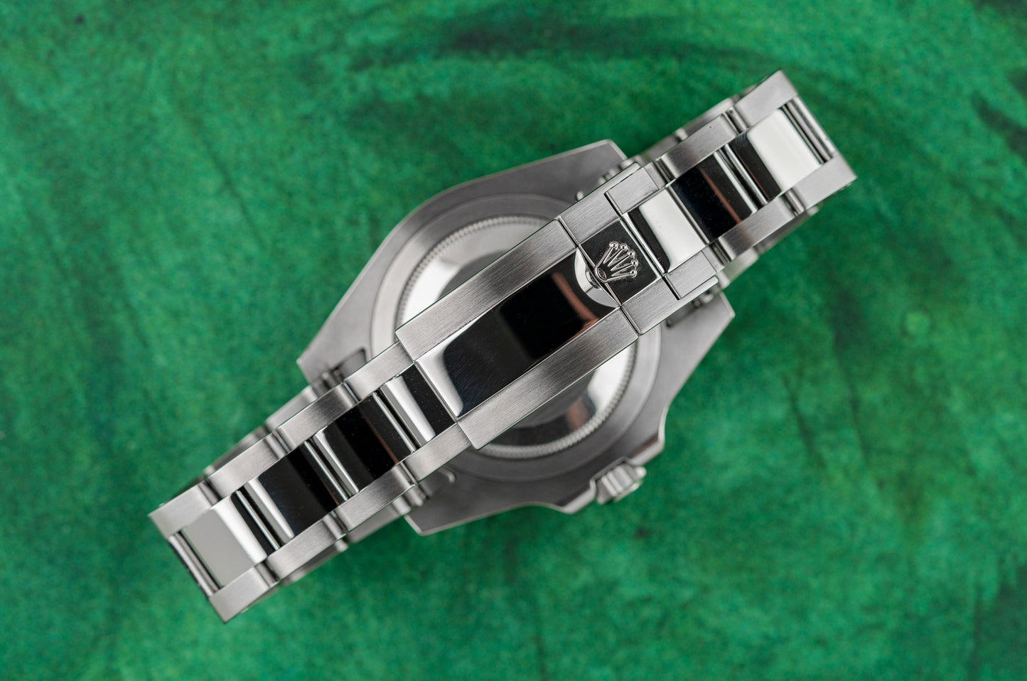 Rolex GMT-Master II 116710LN stainless steel watch with black dial, green GMT hand, and ceramic bezel