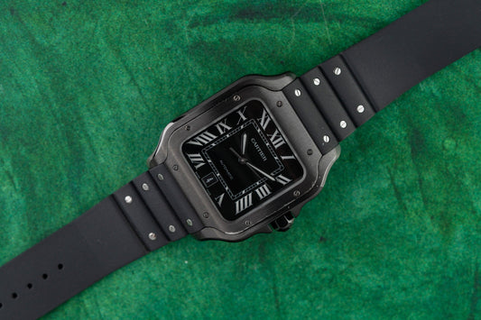 Cartier Santos de Cartier Large WSSA0039 Black DLC Steel 2026 - 39.8mm all-black case on rubber strap with polished exposed screws front view