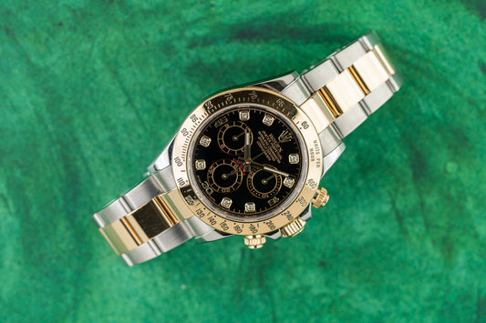 Rolex Cosmograph Daytona 116523 Two-Tone Black Diamond Dial Yellow Gold 2014 - 40mm chronograph front view