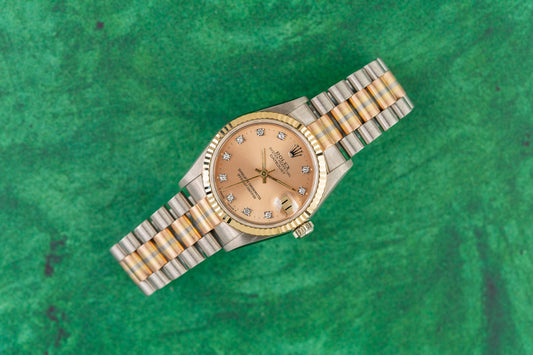 Rolex Datejust 31 68279 Tridor Champagne Diamond Dial circa 1986 - white gold case, yellow gold fluted bezel, three colour gold President bracelet front view