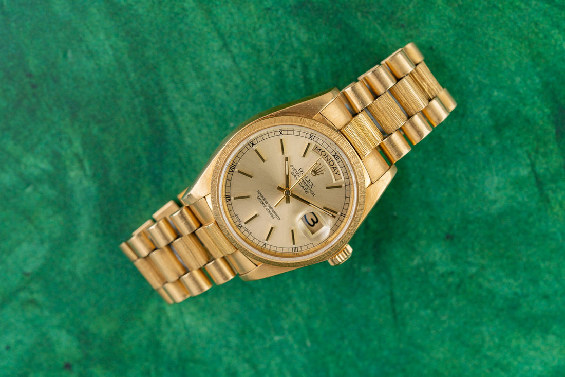 Rolex Day-Date 36 18078 Bark Bezel Yellow Gold Silver Dial 1981 - 36mm President dress watch with textured bark finish front view