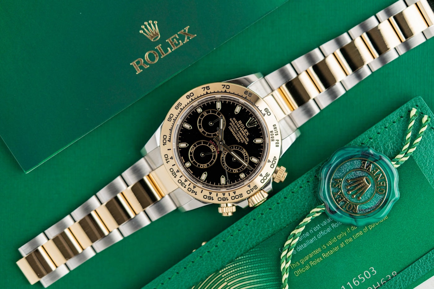 Rolex Daytona pre-owned brand new two tone yellow gold black dial 116503