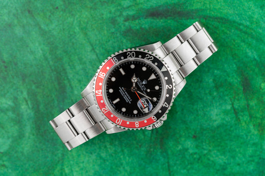 Rolex GMT-Master II 16710 Stainless Steel 2004 Model F Serial
