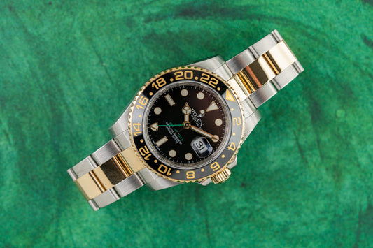 Rolex GMT-Master II 116713LN Two Tone Yellow Gold Black Dial