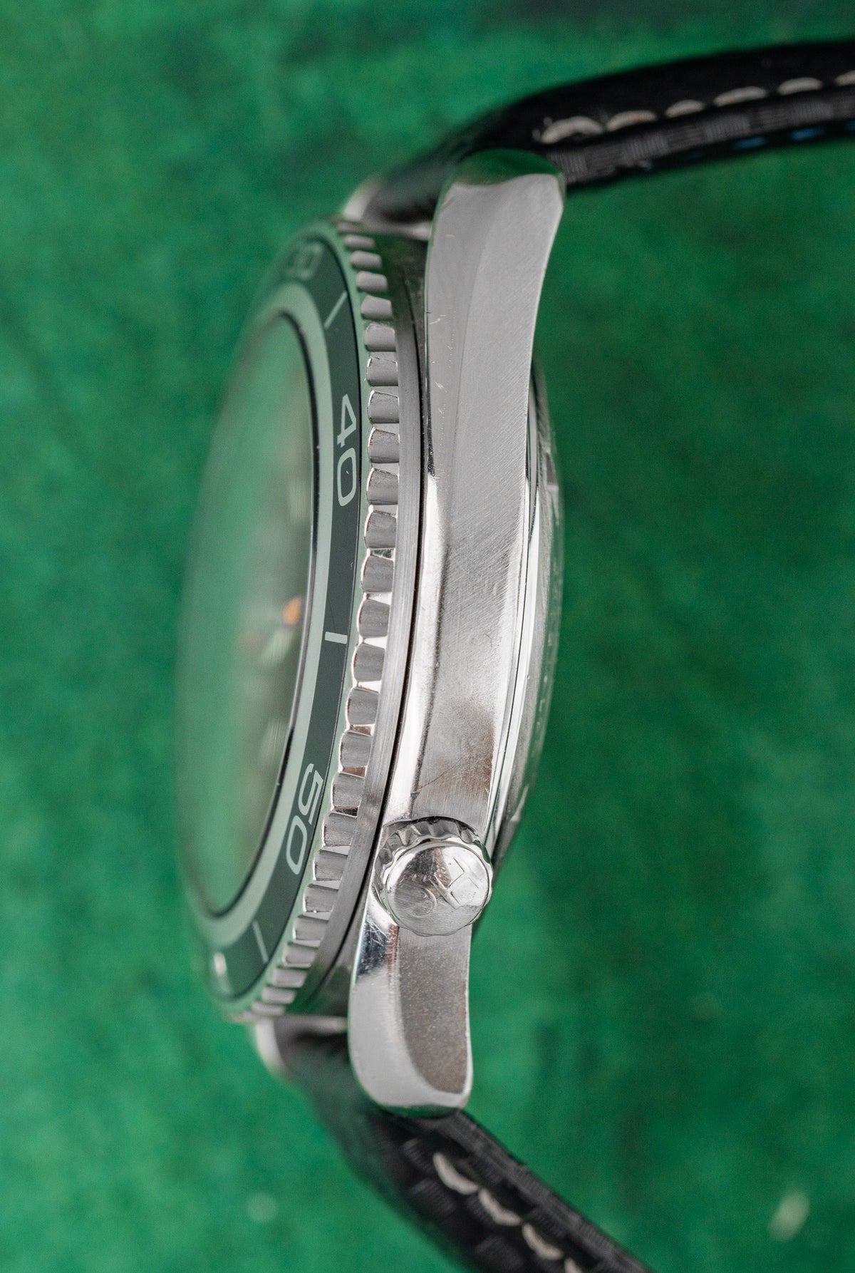 Omega Planet Ocean Casino Royale 2907.50.91 Black Dial Helium Valve Case Profile - The Watch Business Sydney CBD