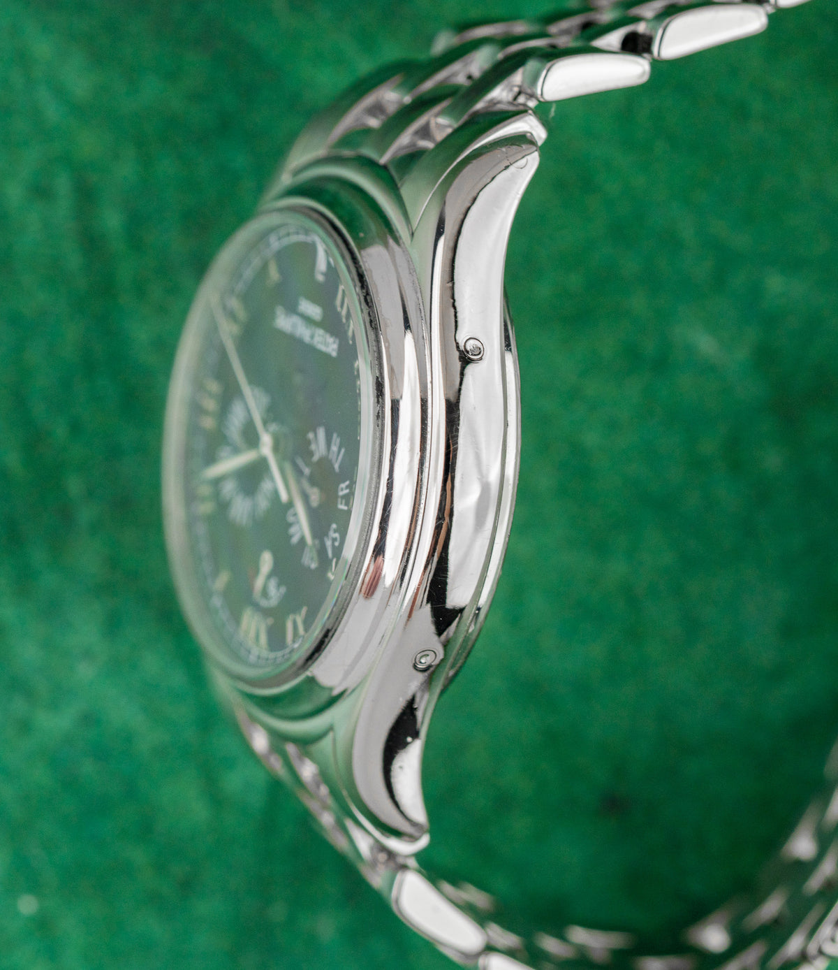 Patek Philippe Annual Calendar 5036/1G Black Roman Dial White Gold Case Profile - The Watch Business Sydney