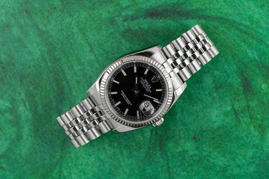 
Rolex Datejust 36 Black Index Dial Roulette Date Wheel 116234 Stainless Steel