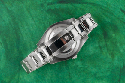 Rolex Datejust II Silver Diamond Dial 116334 case and crown - The Watch Business
