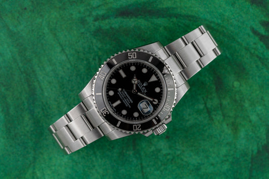 Rolex Submariner Date 116610LN stainless steel watch with black dial, pre-owned luxury watch sold by The Watch Business Sydney