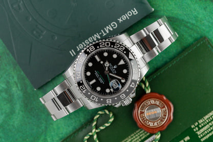 Rolex GMT-Master II 116710LN Black Dial Green 24-Hour Arrow Hand and Cerachrom Bezel - The Watch Business Sydney