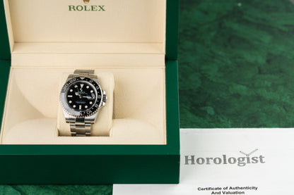 Rolex GMT-Master II 116710LN stainless steel watch with black dial, green GMT hand, and ceramic bezel