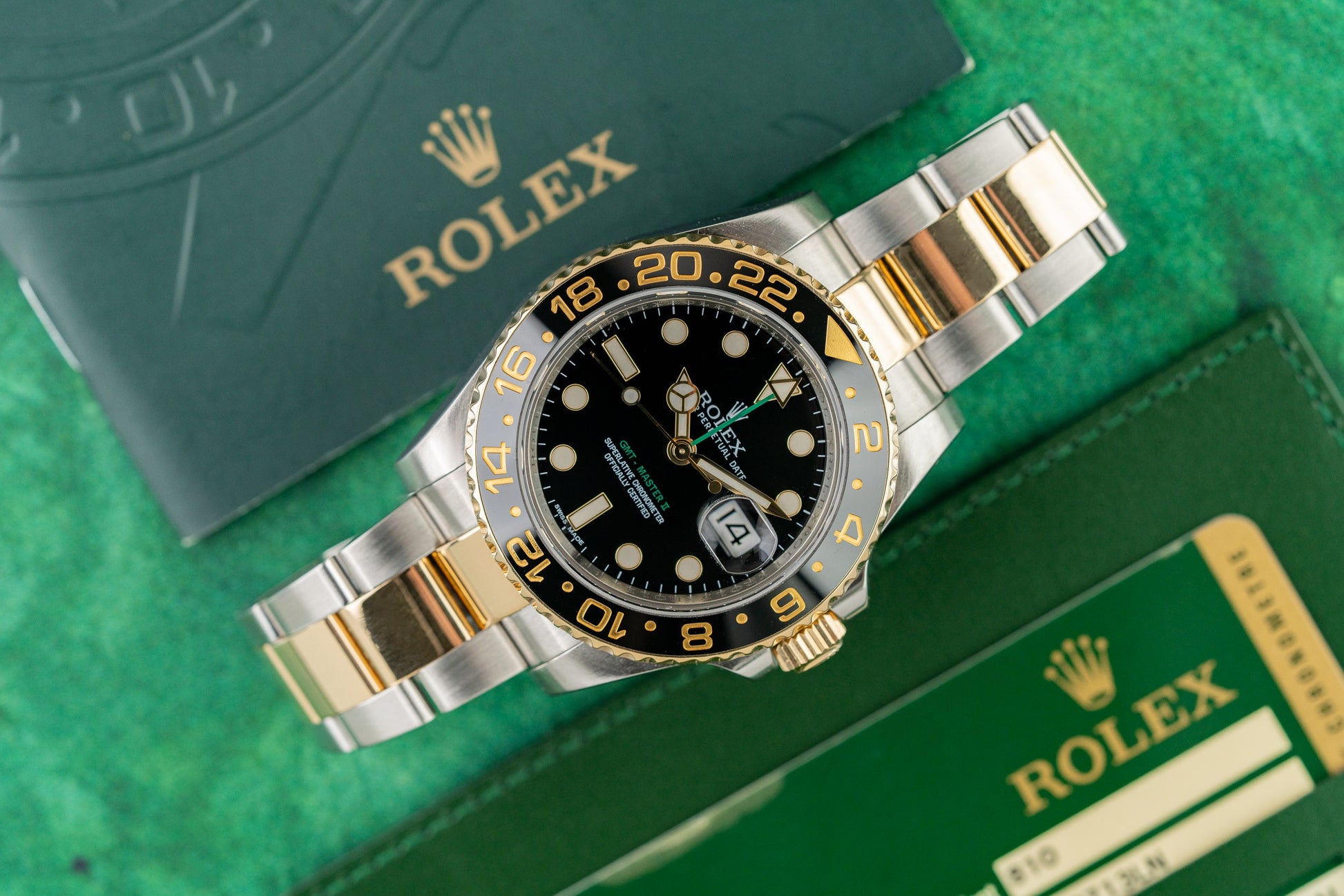 Rolex GMT-Master II 116713LN Black Dial Two-Tone Yellow Gold Case Ceramic Bezel - The Watch Business Sydney CBD