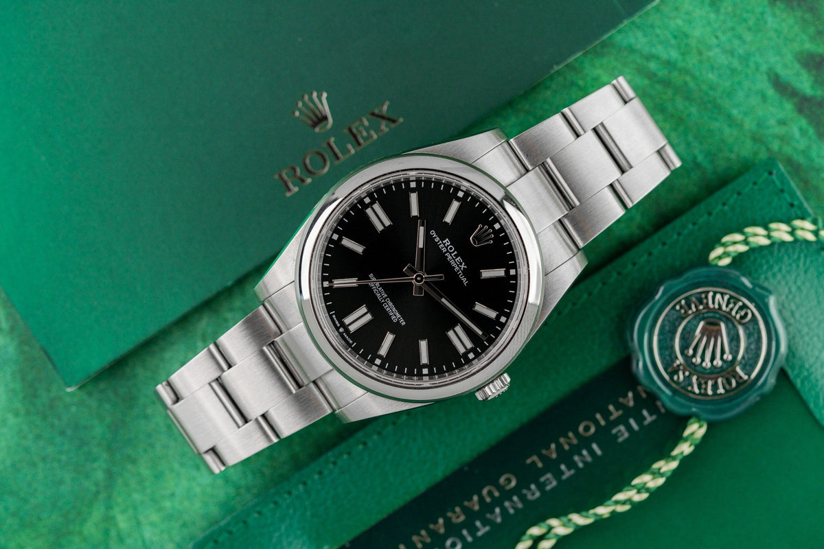 Rolex Oyster Perpetual 41 124300 Black Dial with Warranty Card and Hang Tag - The Watch Business Sydney