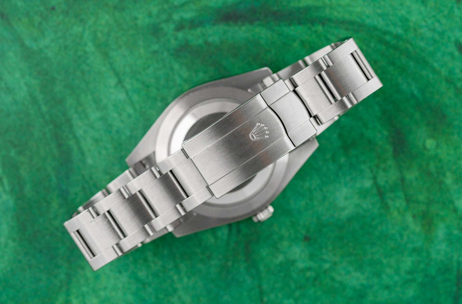 Rolex Oyster Perpetual 41 Green Dial 124300 case and crown - The Watch Business