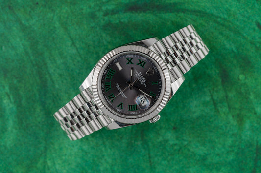 Rolex Datejust 41 stainless steel watch, model 126334, Wimbledon dial, fluted bezel on Jubilee bracelet, 2022, pre-owned luxury watch sold by The Watch Business Sydney