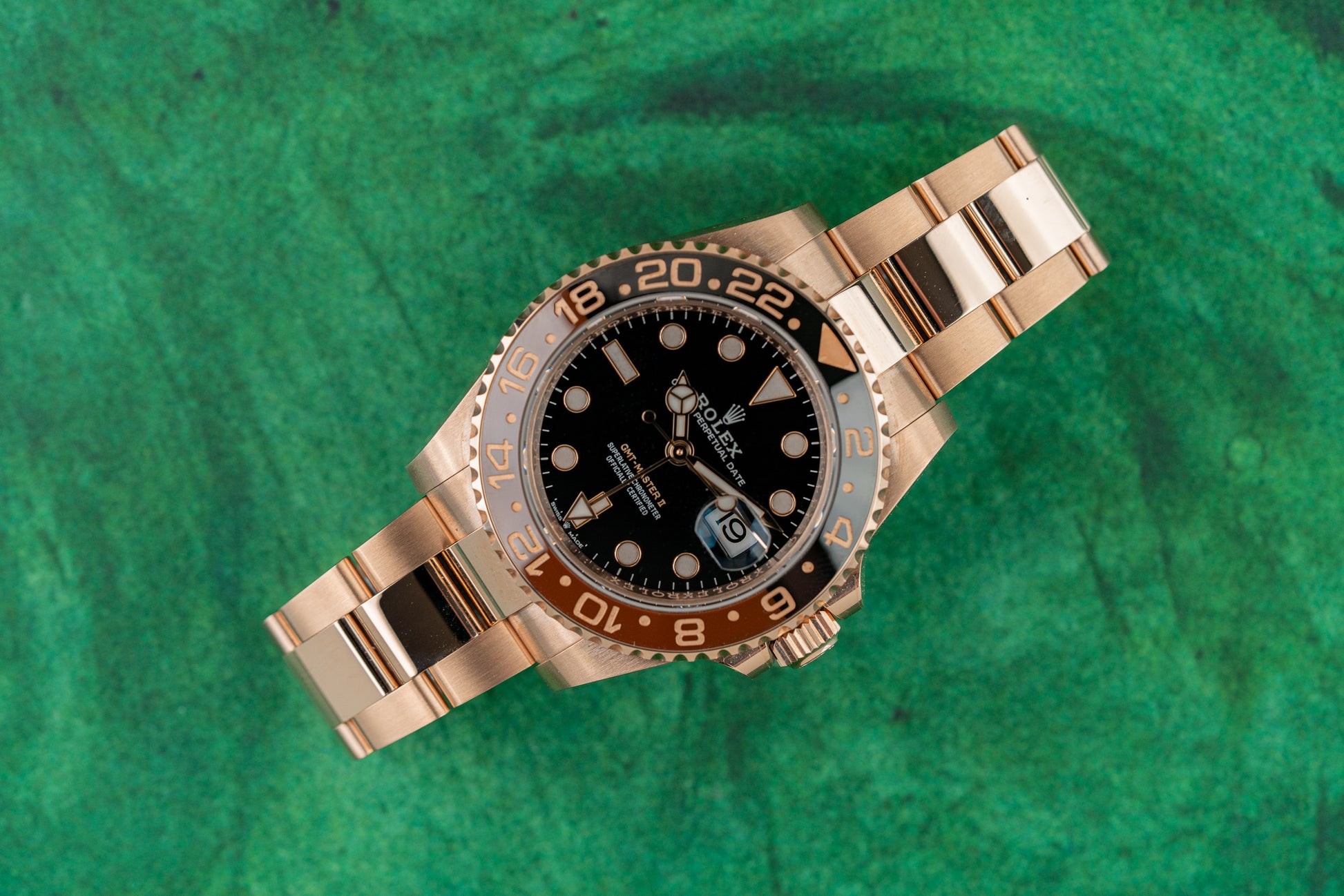Buy a Rolex GMT-Master II 18k Everose gold watch, model 126715CHNR, Root Beer, 2023, pre-owned luxury watch sold by The Watch Business Sydney.