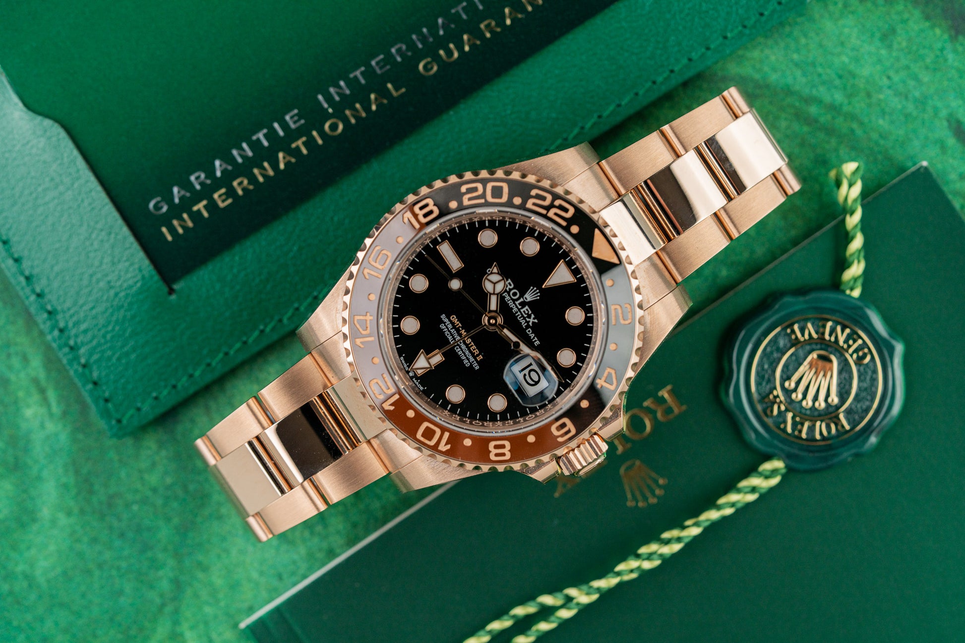 Buy a Rolex GMT-Master II 18k Everose gold watch, model 126715CHNR, Root Beer, 2023, pre-owned luxury watch sold by The Watch Business Sydney.