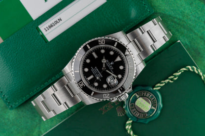 Rolex Submariner Date 116610LN - Black dial, stainless steel, 2020 model. One of the last of its generation. Full set with box & papers. Shop iconic dive watches in Sydney.