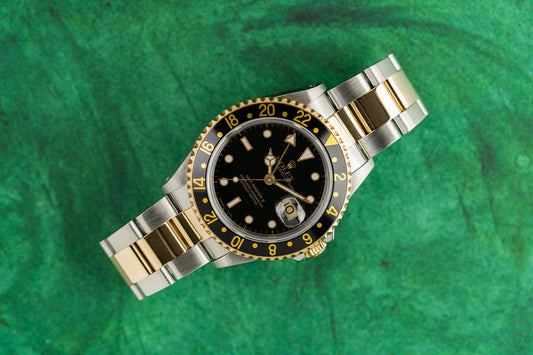 Rolex GMT-Master II 16713 Two Tone Yellow Gold Black Dial 1991 Model