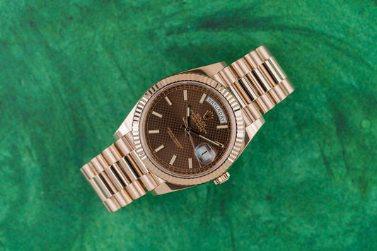 Rolex Day-Date 40 228235 - Everose gold with stunning chocolate motif dial, 2020. Full set, one link short. Shop Sydney luxury.