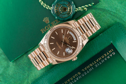 Rolex Day-Date 40 228235 - Everose gold with stunning chocolate motif dial, 2020. Full set, one link short. Shop Sydney luxury.
