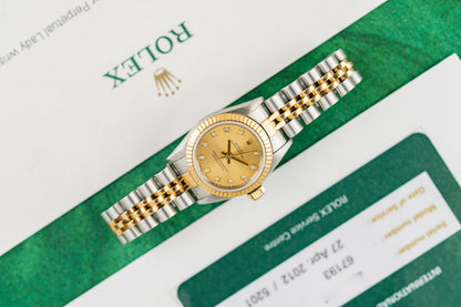 Rolex Oyster Perpetual 26mm Champagne Diamond Dial 67193 case and crown - The Watch Business