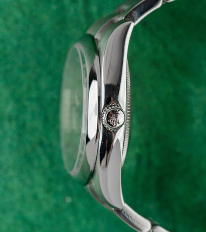 Rolex Air-King 114200 Rhodium Roman Dial Smooth Bezel Case - The Watch Business Sydney CBD
