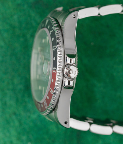Rolex GMT-Master II 16710 Coke Black Dial Crown Side Profile - The Watch Business Sydney