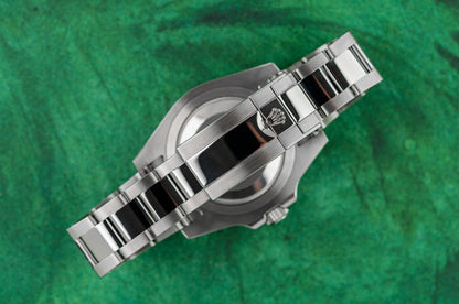 Rolex GMT-Master II 116710LN stainless steel watch with black dial, green GMT hand, and ceramic bezel