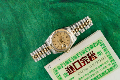 Rolex Lady-Datejust 26 69173 Champagne Tapestry Dial Textured Linen Finish - The Watch Business Sydney
