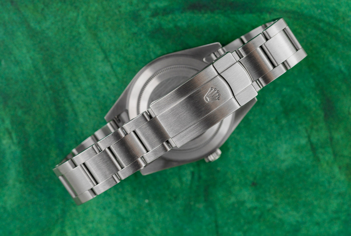 Rolex Oyster Perpetual 39 Rhodium Dial 114300 Stainless Steel 2016 Model case and crown - The Watch Business
