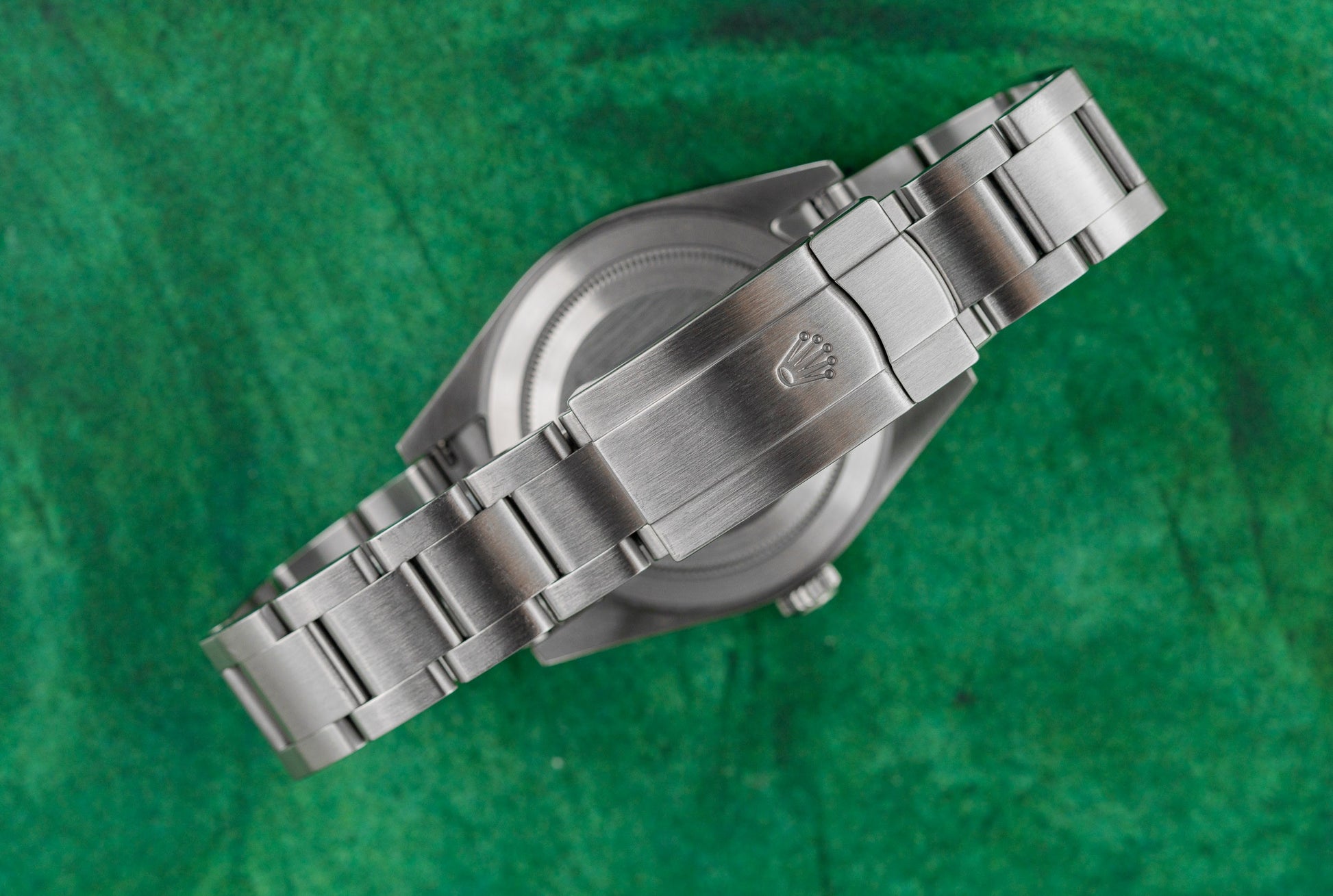 Rolex Oyster Perpetual 39 Rhodium Dial 114300 Stainless Steel 2016 Model case and crown - The Watch Business