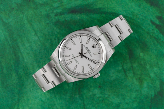 Rolex Oyster Perpetual 39 stainless steel watch, model 114300, white dial, 2018, pre-owned luxury watch sold by The Watch Business Sydney