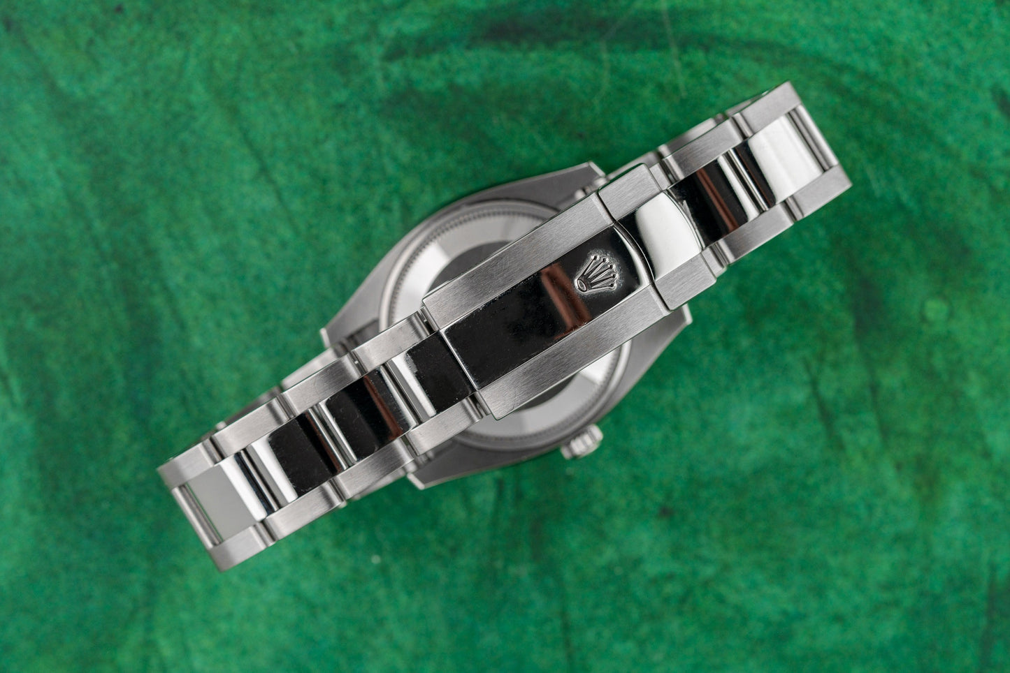 Rolex Oyster Perpetual Date 115234 Black Arabic Diamond Dial White Gold Fluted Bezel Case - The Watch Business Sydney CBD