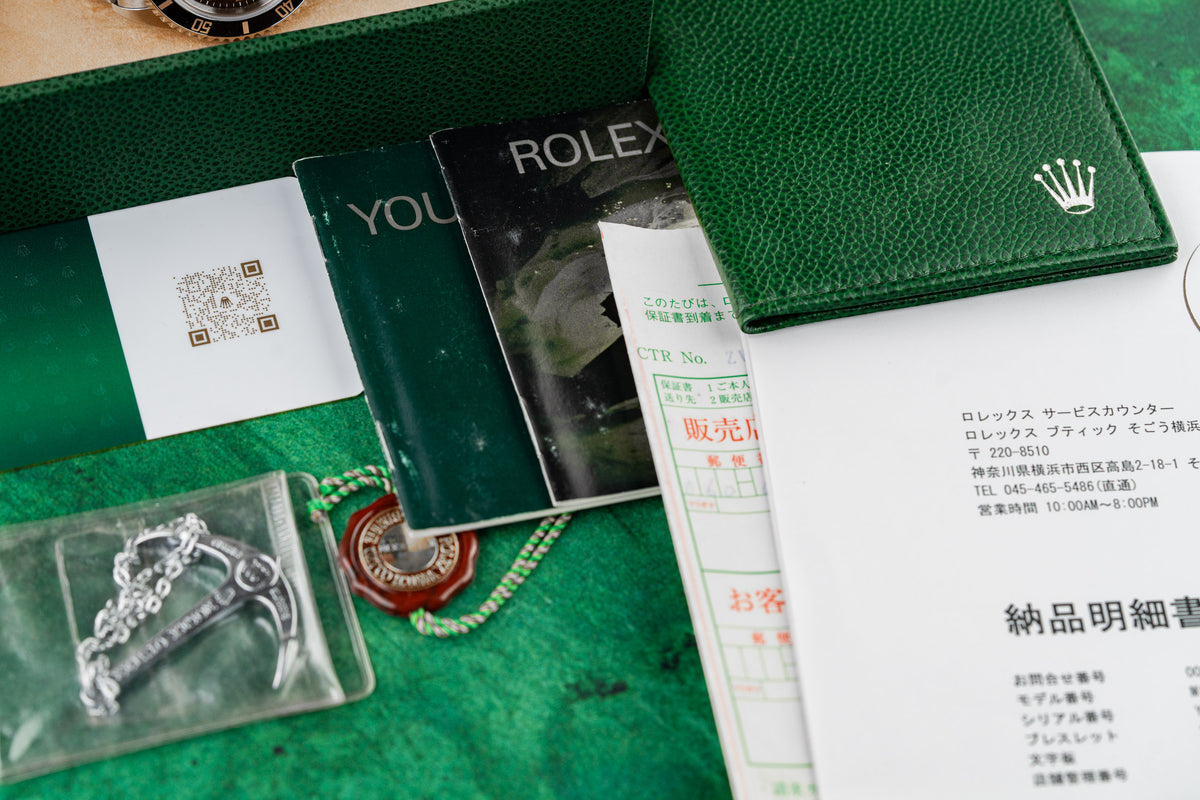 Rolex Sea-Dweller 16600 Black Dial Red Hang Tag and Anchor Trinket - The Watch Business Sydney
