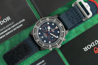 Tudor Pelagos FXD Chrono M25807KN-0001 Blue Dial with Red Accents Chronograph Close-Up - The Watch Business Sydney
